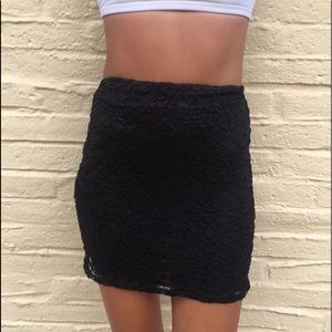Black lace mini skirt